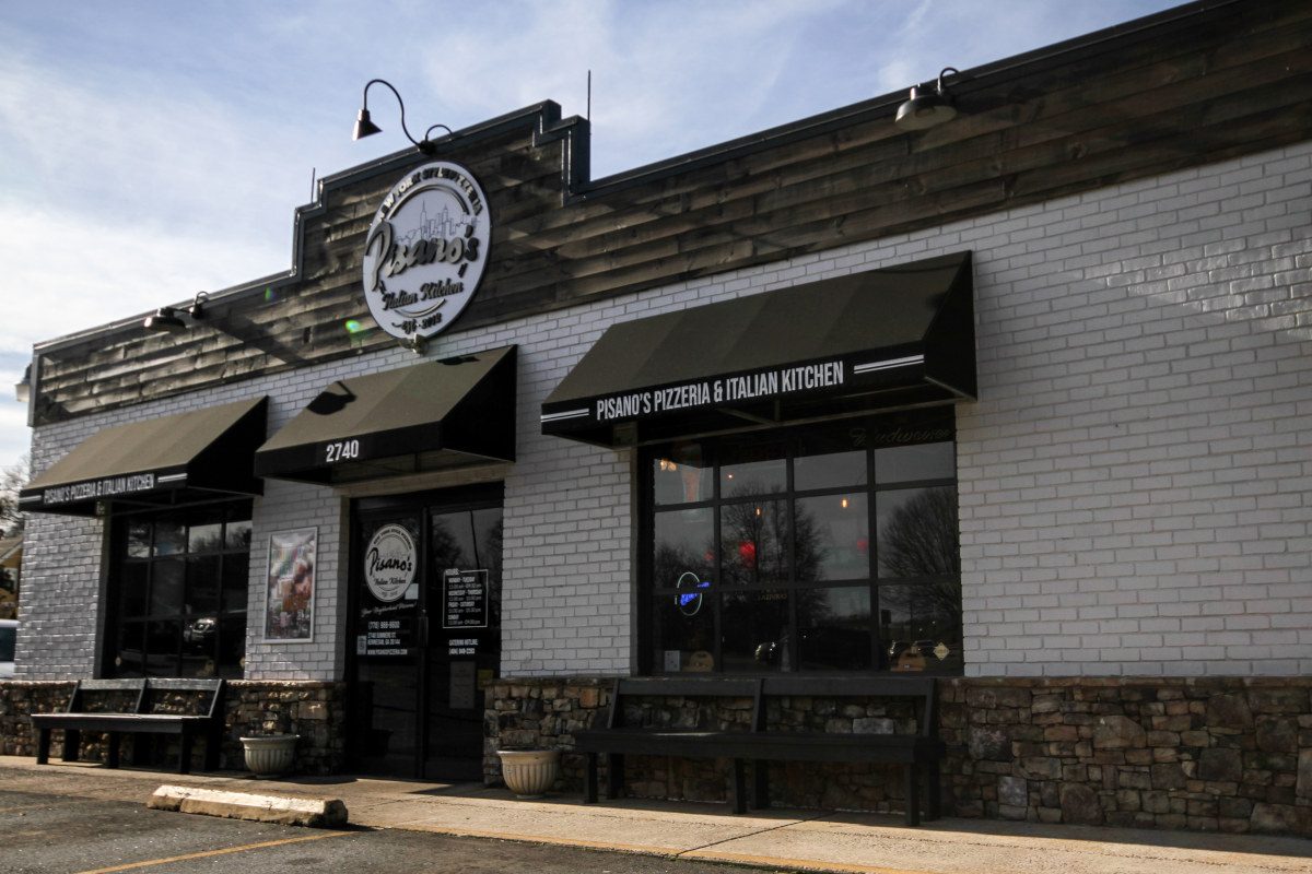 exterior, black awning, Pisano's sign